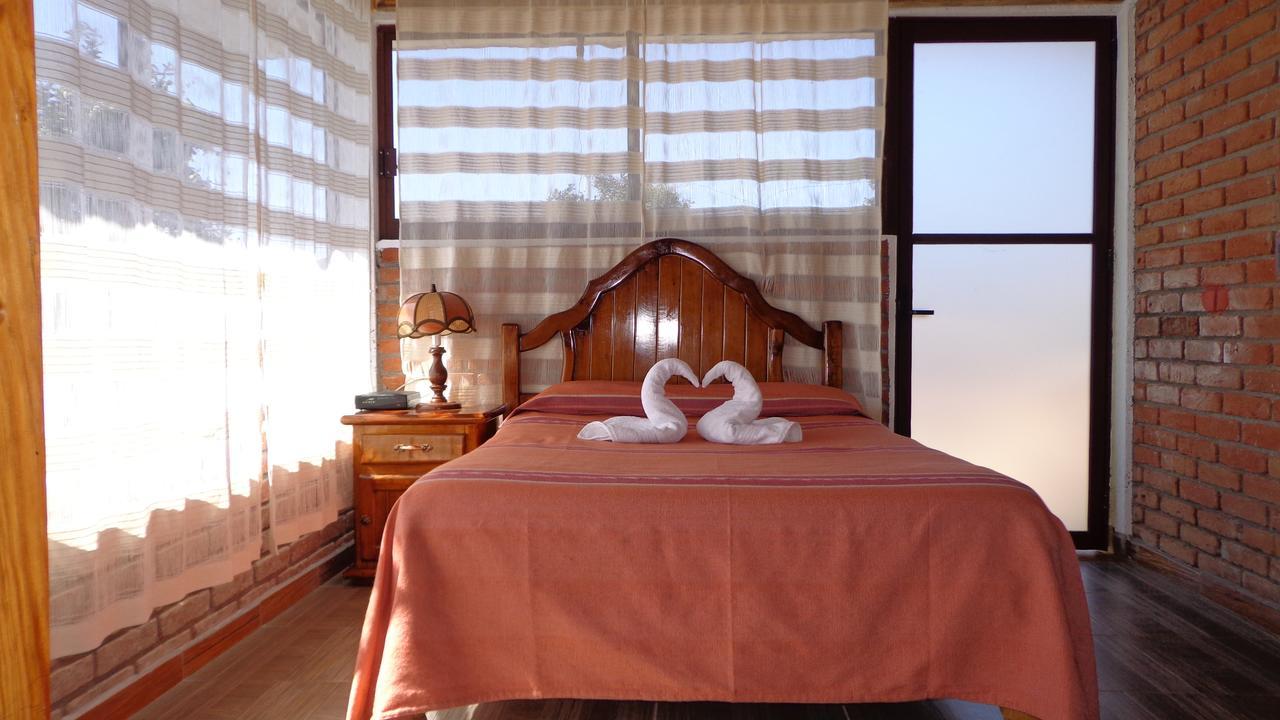 Zirahuen Cuin Habitaciones Rusticas Bagian luar foto