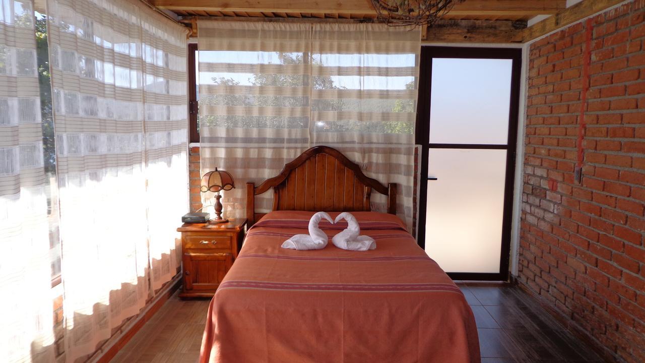 Zirahuen Cuin Habitaciones Rusticas Bagian luar foto